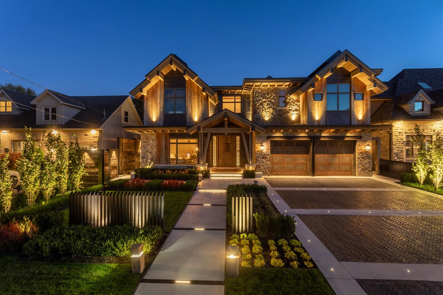 Illuminated front entrance and driveway
