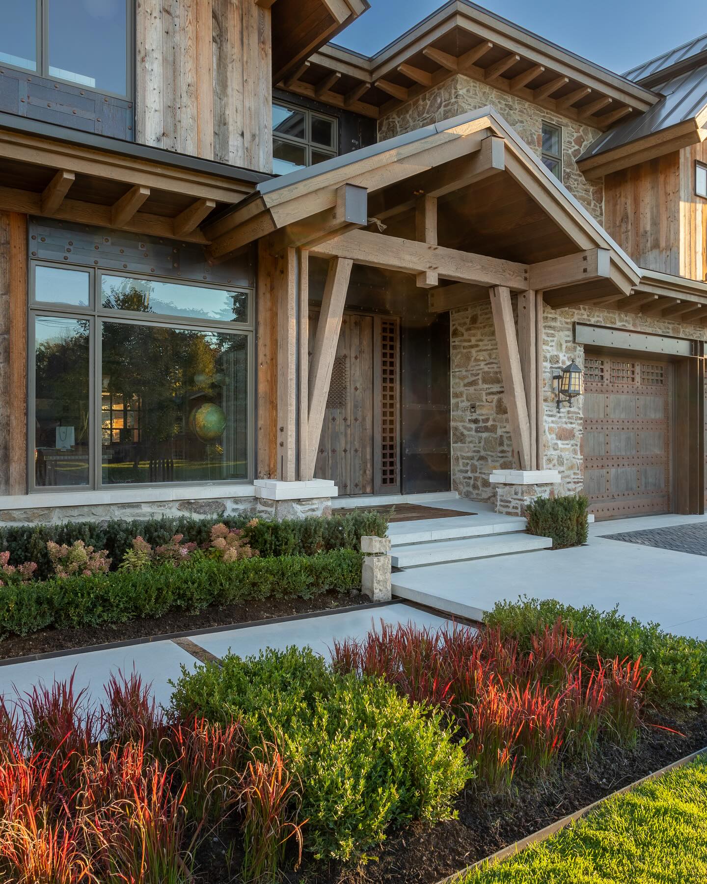 Timber entrance with layered garden planting