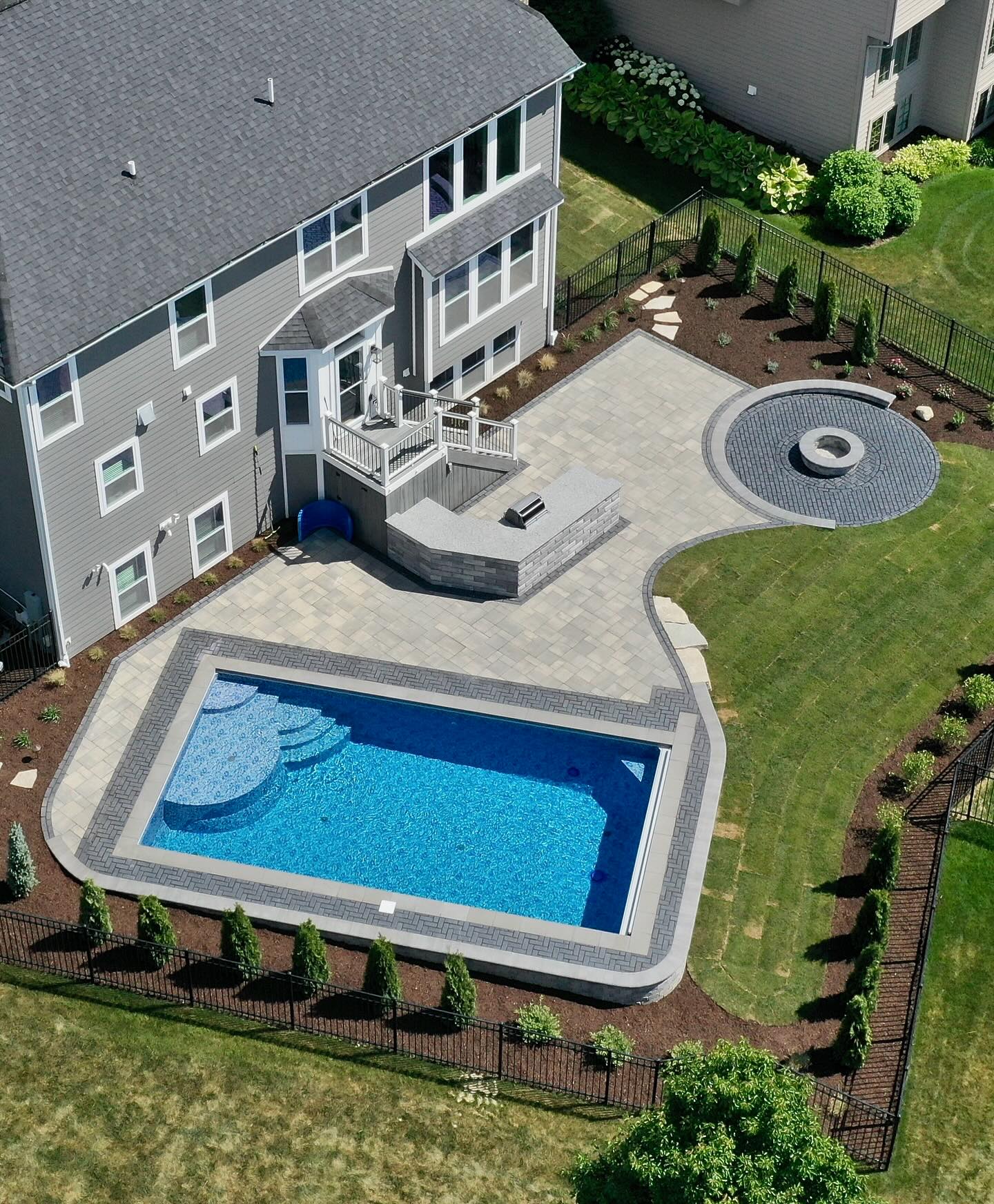 Pool and curved patio from above