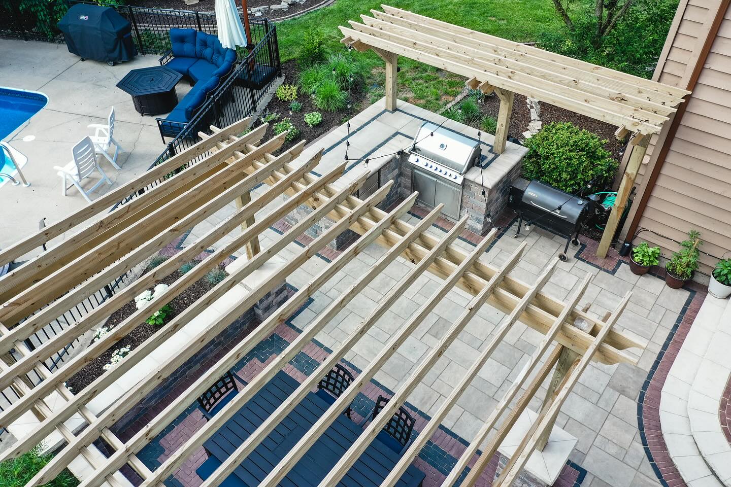 Pergolas and outdoor kitchen from above