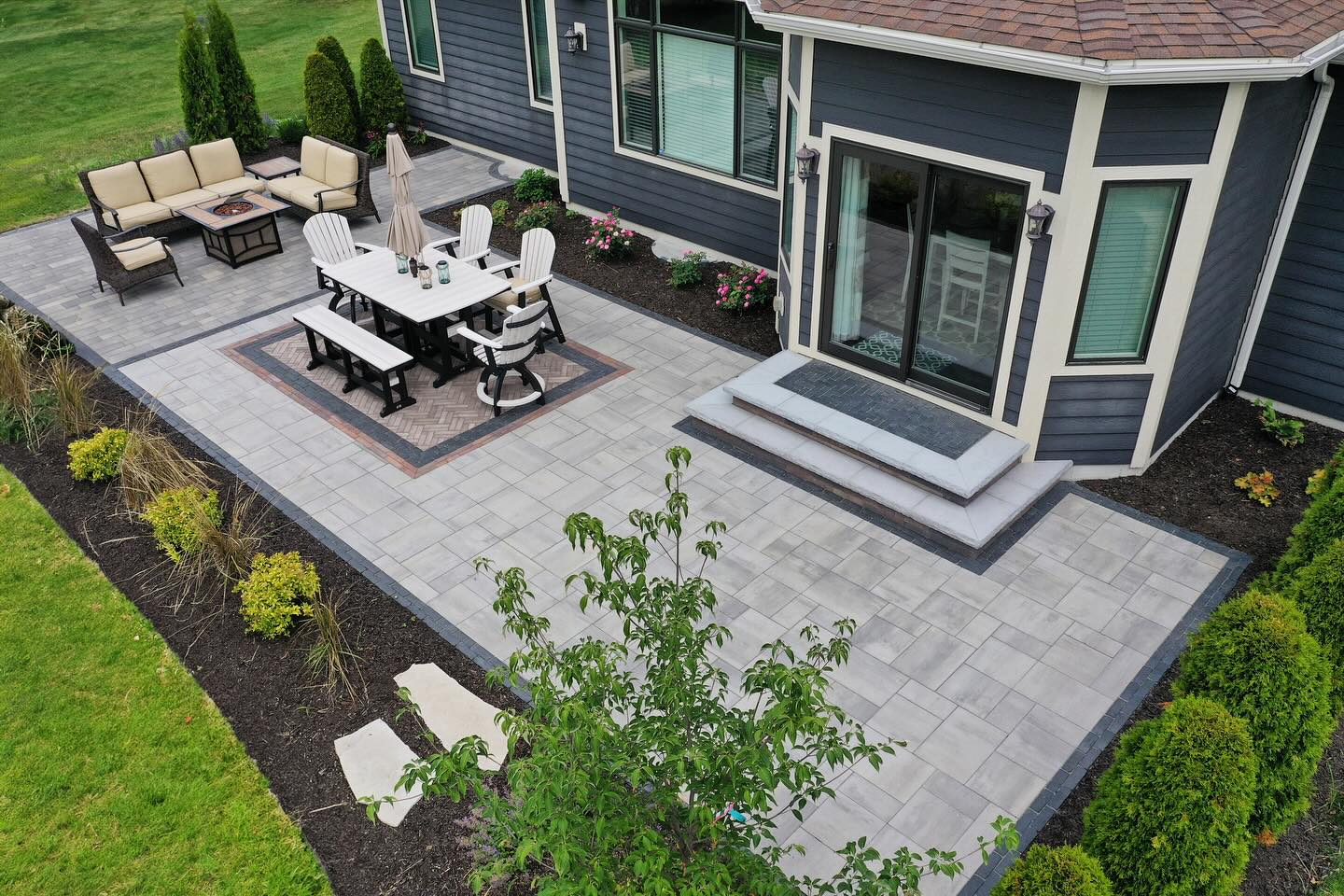 Patio dining beside the house